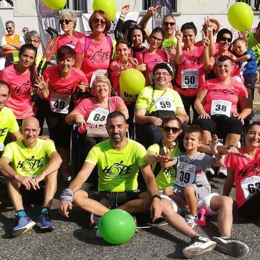 I ragazzi di Hope Running e, sotto, Roberto Ecosse