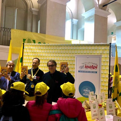 Inalpi e Coldiretti ancora insieme a Spaggiari per portare il genio di Nespolo tra i banchi