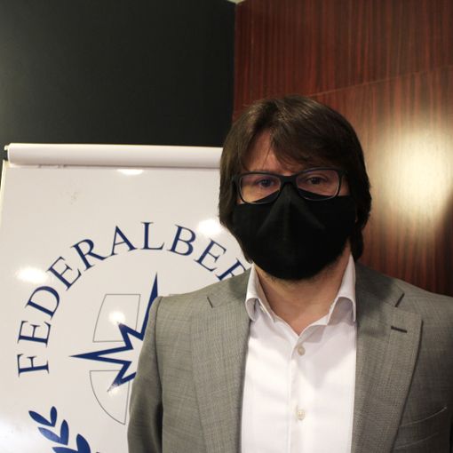 Fabio Borio con mascherina
