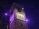 Il campanile di Rondissone colorato di viola