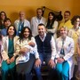 Mamma Federica, papà Domenico e il piccolo Renato con medici e infermieri del Mauriziano
