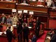 Caso Delmastro, protesta dei 5 Stelle al Senato: banchi del governo occupati e cartelli "Fuori le chat"