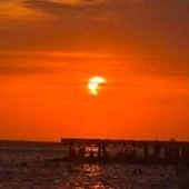 Eclissi parziale di sole, lo spettacolo al tramonto nei cieli d'Italia