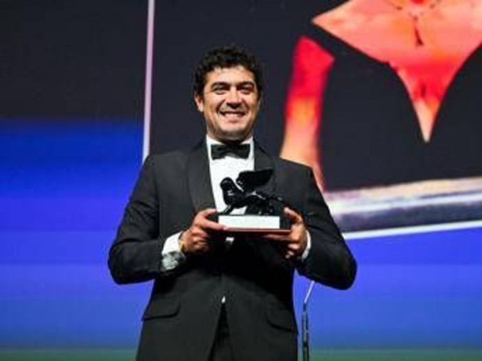 Mostra del cinema, premiati Scamarcio e I figli della scimmia